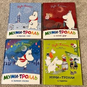 A collection of four Moomin books for children in Russian